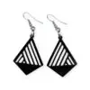 Black Laser Cut Acrylic Slash Earrings with asymmetrical linear cutouts, featuring a bold geometric design, hanging from silver hooks against a white background.