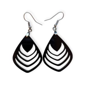 Black laser cut acrylic petal earrings with a series of nested petal-like cutouts, creating a geometric floral effect, hanging from silver hooks against a white background.