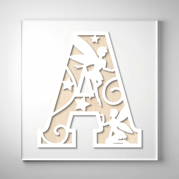 Laser-cut wooden letter "A" featuring two fairies, stars, and swirling patterns over a natural wood grain background.